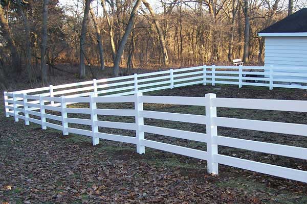 White fence at the backyard.