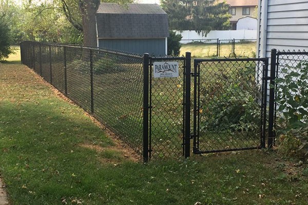 Chain link black wooden fence at Batavia, IL Chain link black wooden fence at Batavia, IL