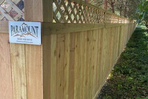 A fence with a sign labeled Paramount in Batavia, IL