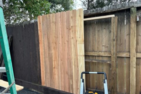 New cedar pickets installed on backyard fence in Chicago, IL