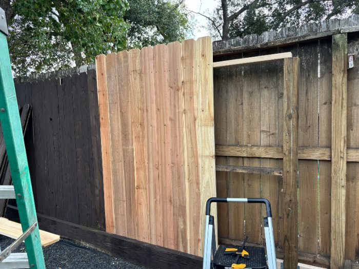 New cedar pickets installed on backyard fence in Chicago, IL